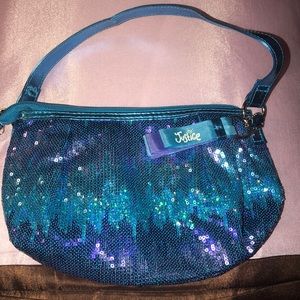 Justice Purse. Sequence in blue